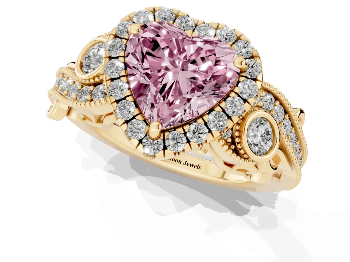 Fancy Pink Heart Cut Halo Diamond Ring with Milgrain and Bezel Accents on a Split Shank Band Yellow gold