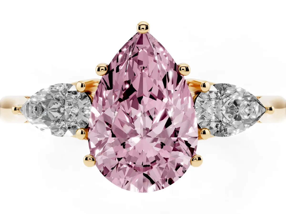 Fancy Pink Pear Cut Diamond Three-Stone Ring with Pear Side Stones and Prong Setting Yellow gold