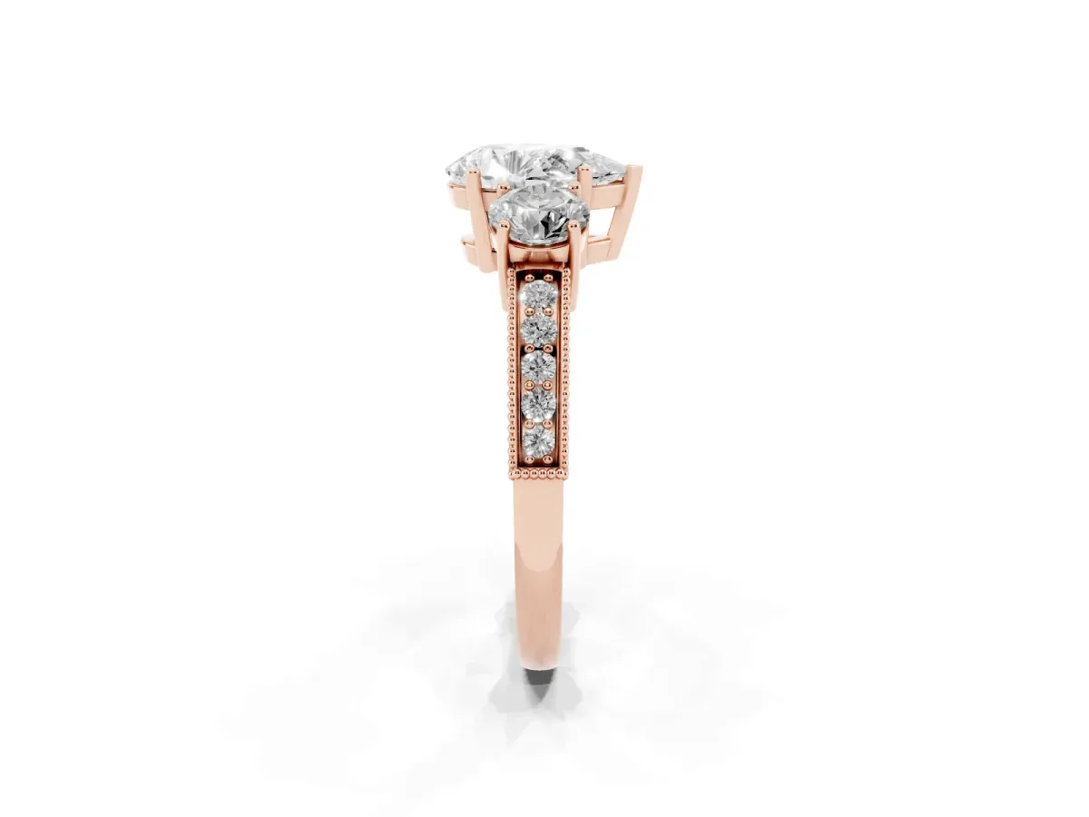 Pear Cut Three-Stone Diamond Ring with Pavé Band and Four-Prong Setting Rose gold