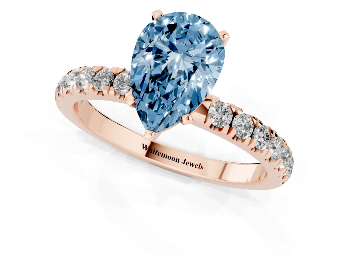 Fancy Blue Pear Cut Diamond Solitaire Ring with Pavé Accents and Four-Prong Setting Rose gold