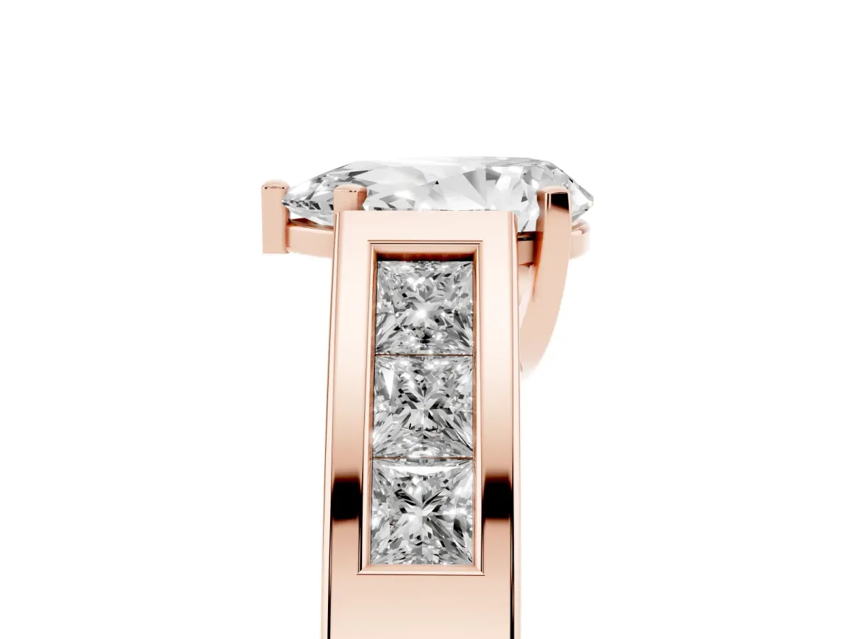 Pear Cut Cut Channel Set Solitaire Ring with Four-Prong Setting Rose gold
