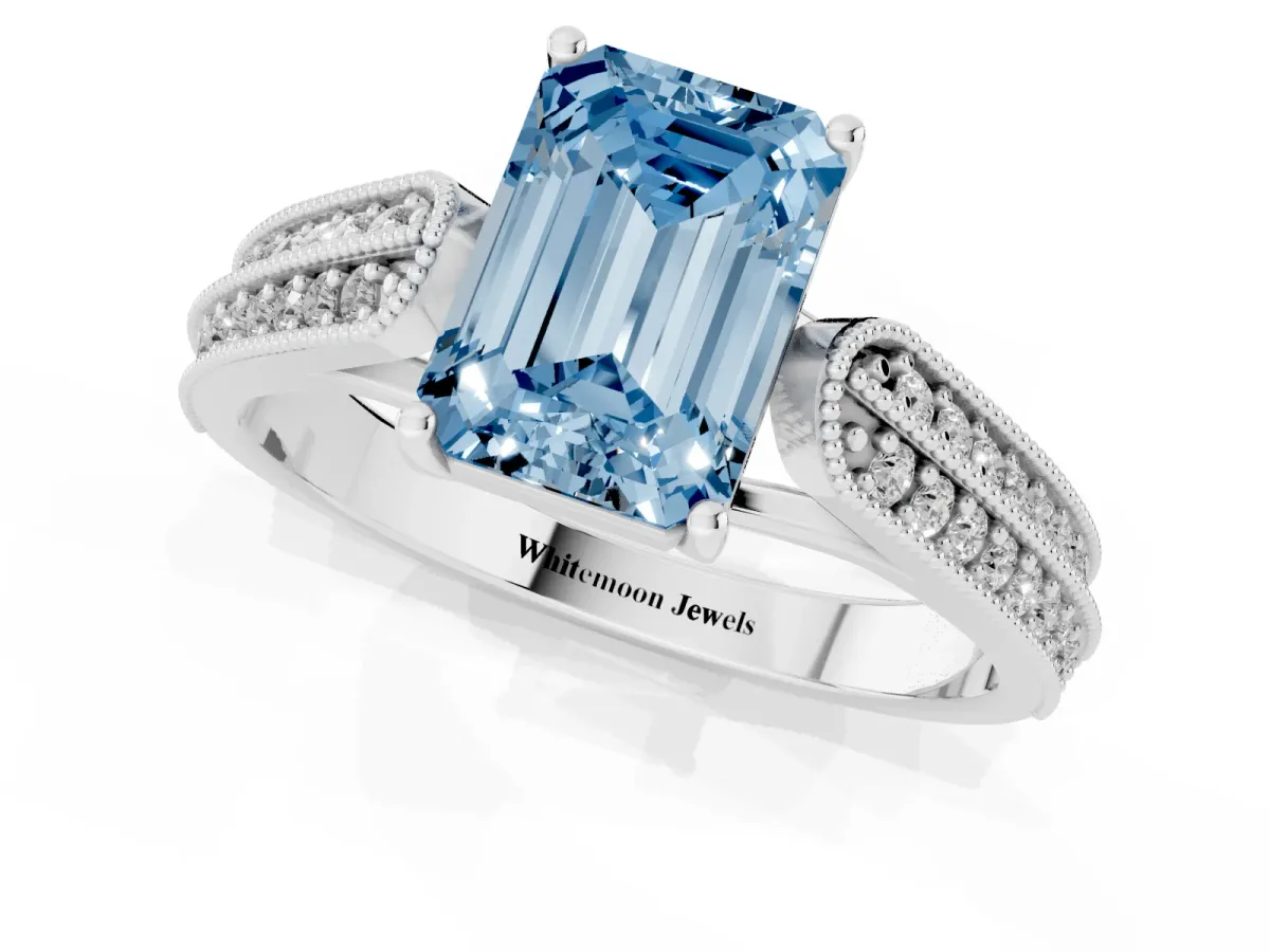 Fancy Blue Emerald Cut Cut Pave Split Shank Engagement Ring with Four-Prong Setting White gold
