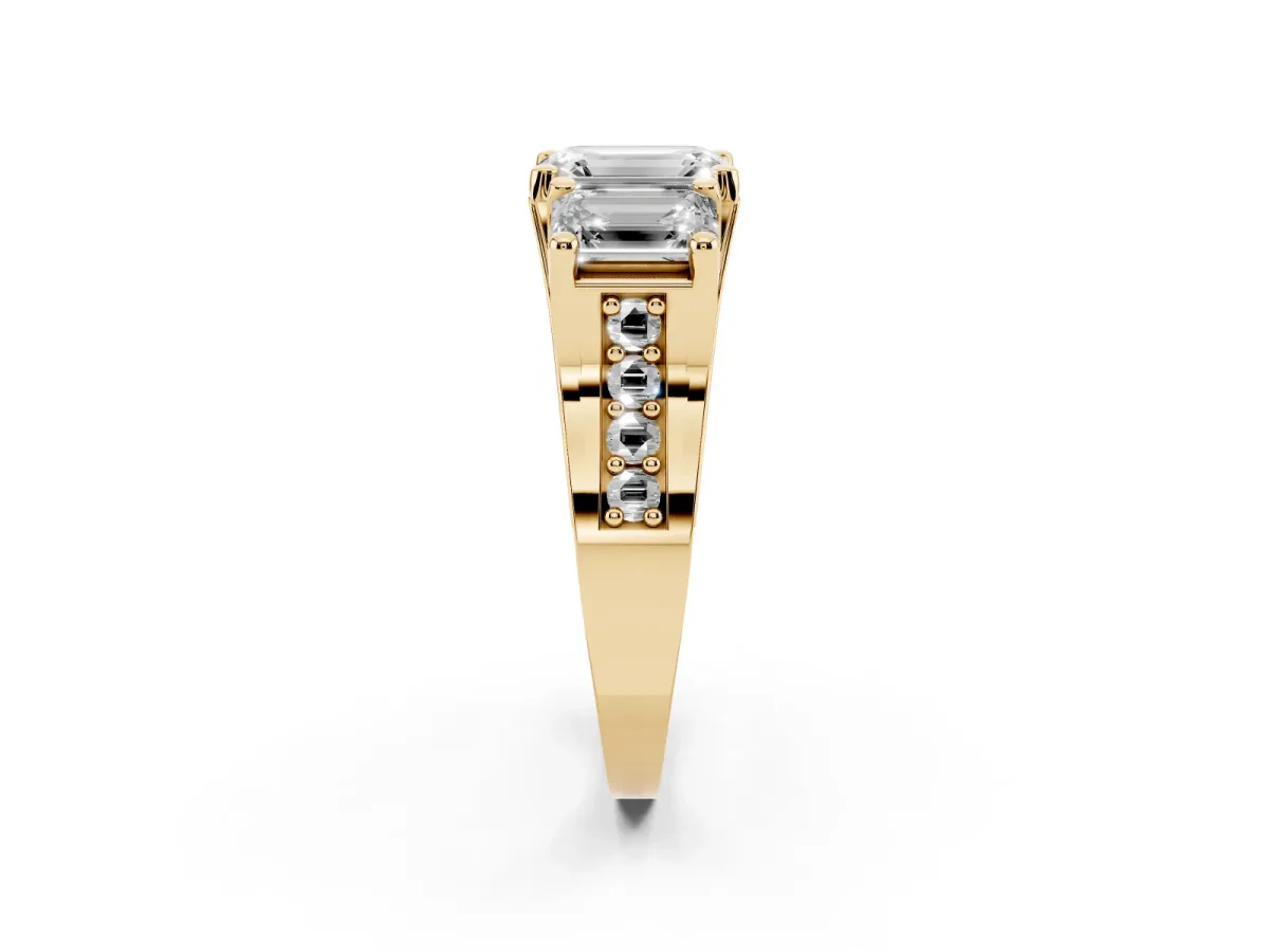 Emerald Cut Diamond Three-Stone Ring with Channel Set Band and Four-Prong Setting Yellow gold