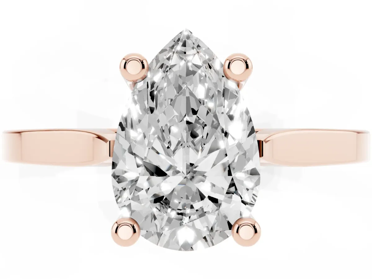 Pear Cut Solitaire Diamond Ring with Four-Prong Setting and Tapered Band Rose gold