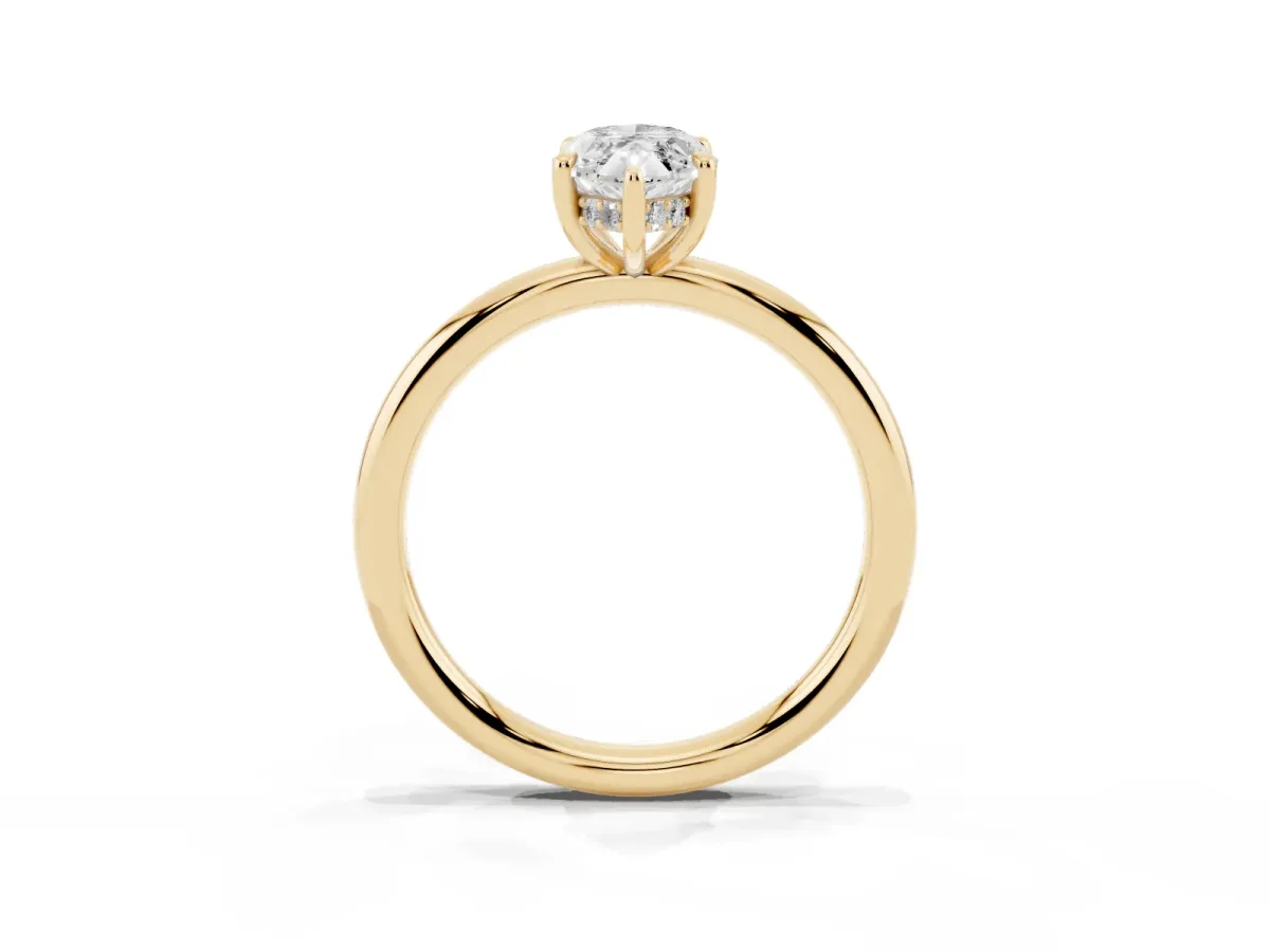 Marquise Cut Diamond Solitaire Ring with Thin Band and Four-Prong Setting Yellow gold