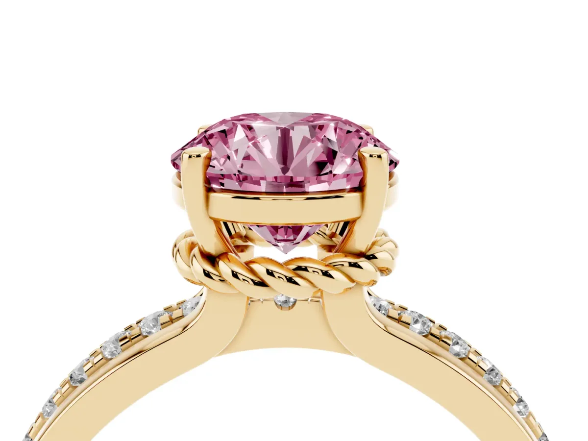 Fancy Pink Round Cut Solitaire Diamond Ring with Channel Set Band and Six-Prong Setting Yellow gold