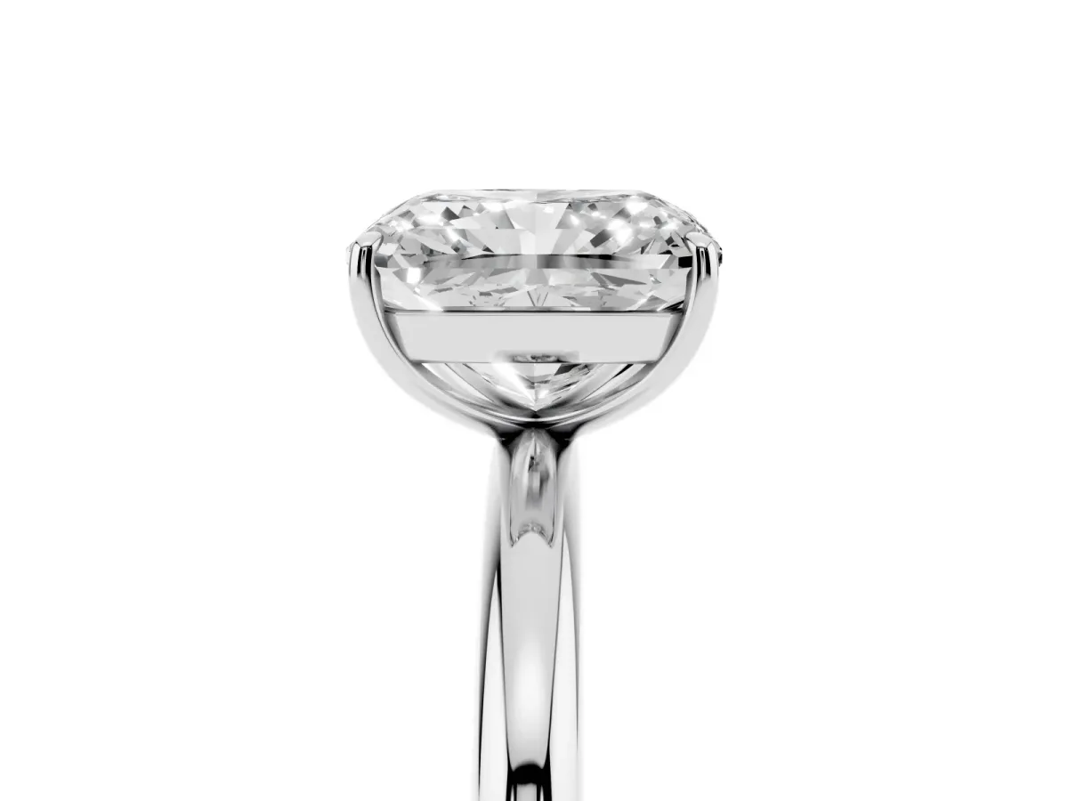 Radiant Cut Solitaire Diamond Ring with Four-Prong Setting on a Plain Band Platinum