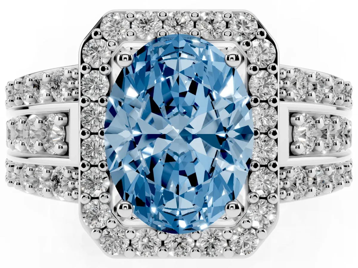 Fancy Blue Oval Cut Halo Diamond Ring with Round Split Shank and Prong Setting White gold