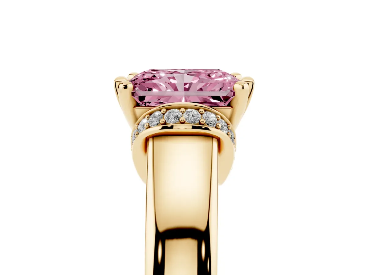 Fancy Pink Radiant Cut Solitaire Diamond Ring with Pave Band and Six-Prong Setting Yellow gold