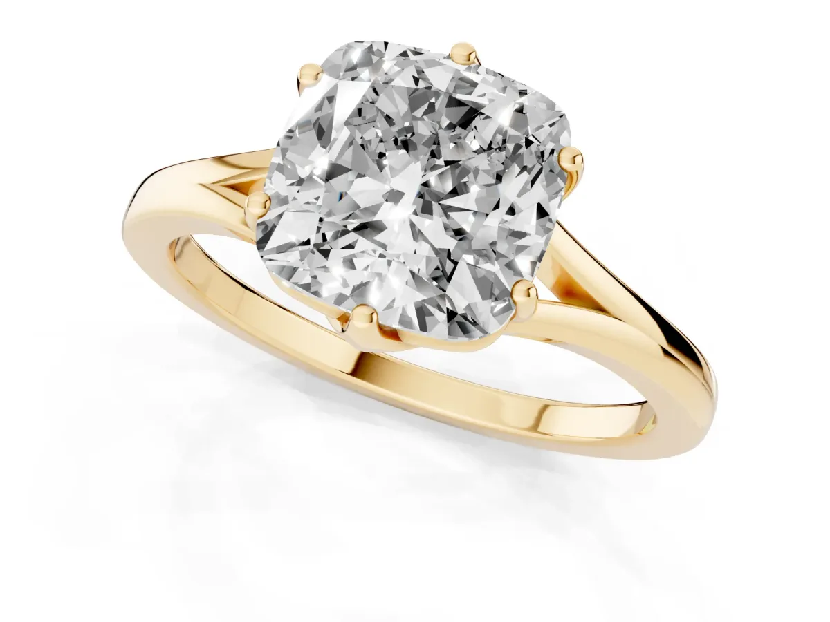 Cushion Cut Solitaire Diamond Ring with Six-Prong Setting and Tapered Band Yellow gold
