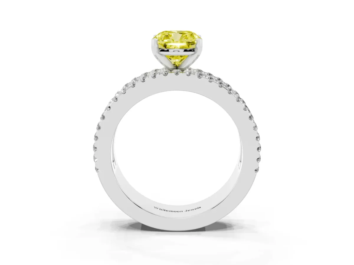 Fancy Yellow Cushion Cut Diamond Solitaire Ring with Pavé and Channel Set Band Platinum