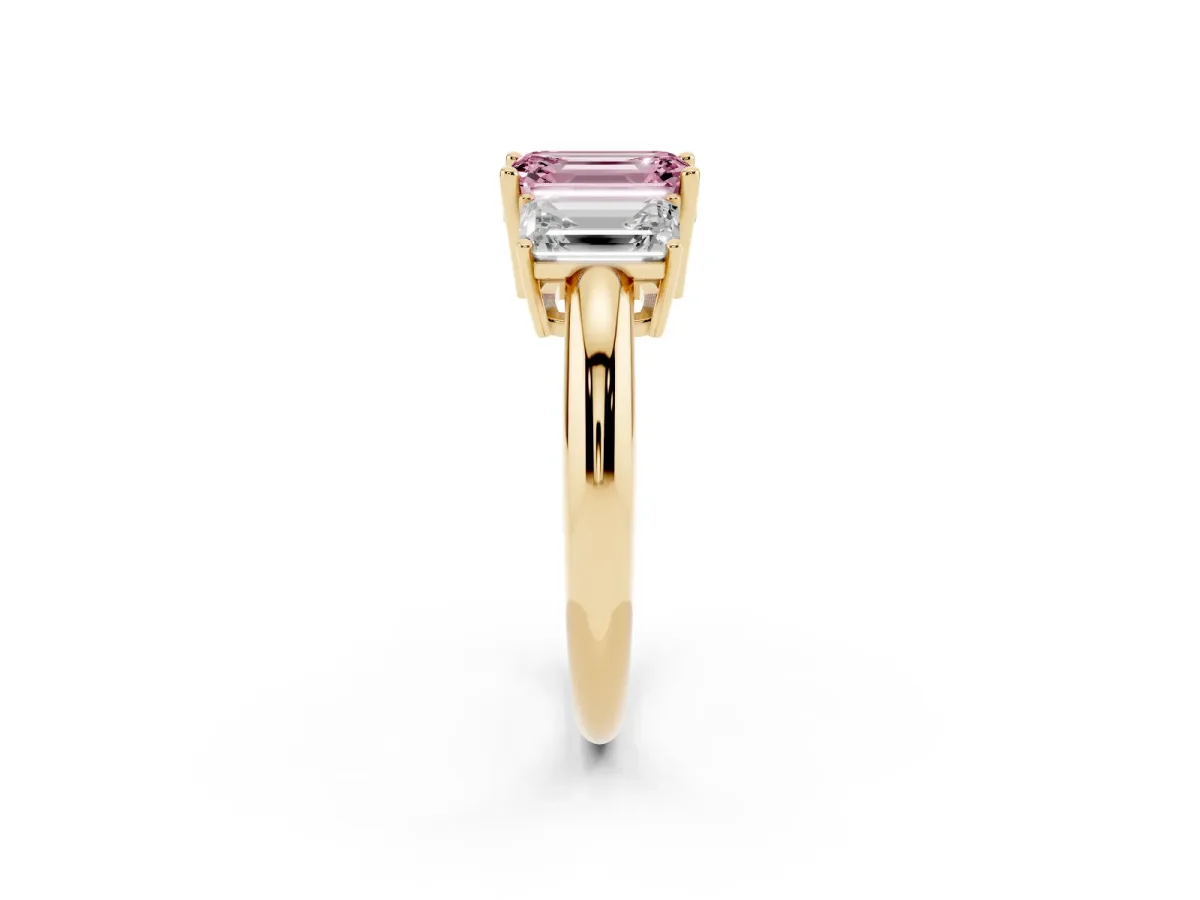 Fancy Pink Three-Stone Emerald Cut Cut Diamond Engagement Ring with Prong Setting on a White Gold Band Yellow gold