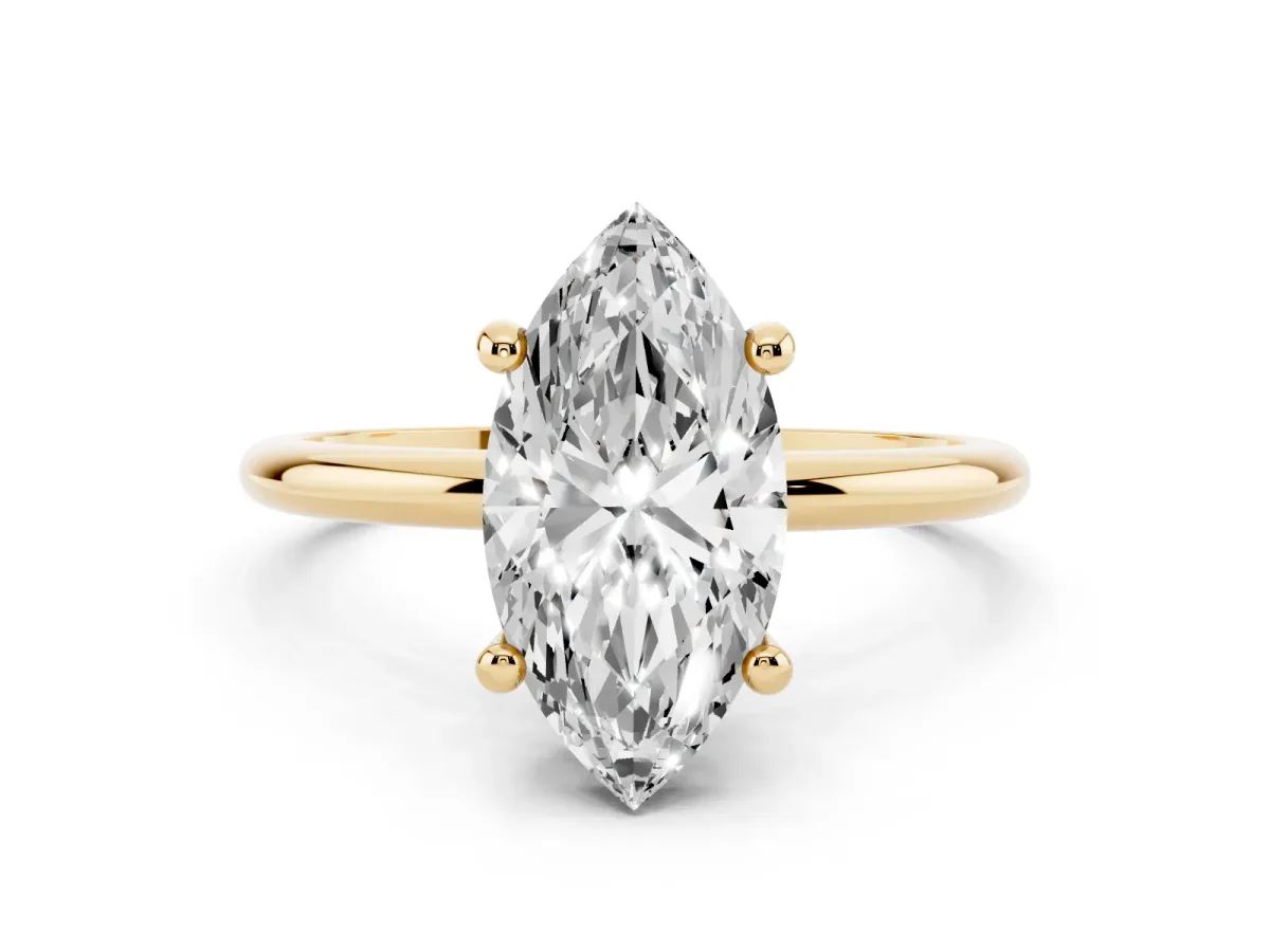 Marquise Cut Solitaire Diamond Ring with 4-Prong Setting on a Classic Band Yellow gold