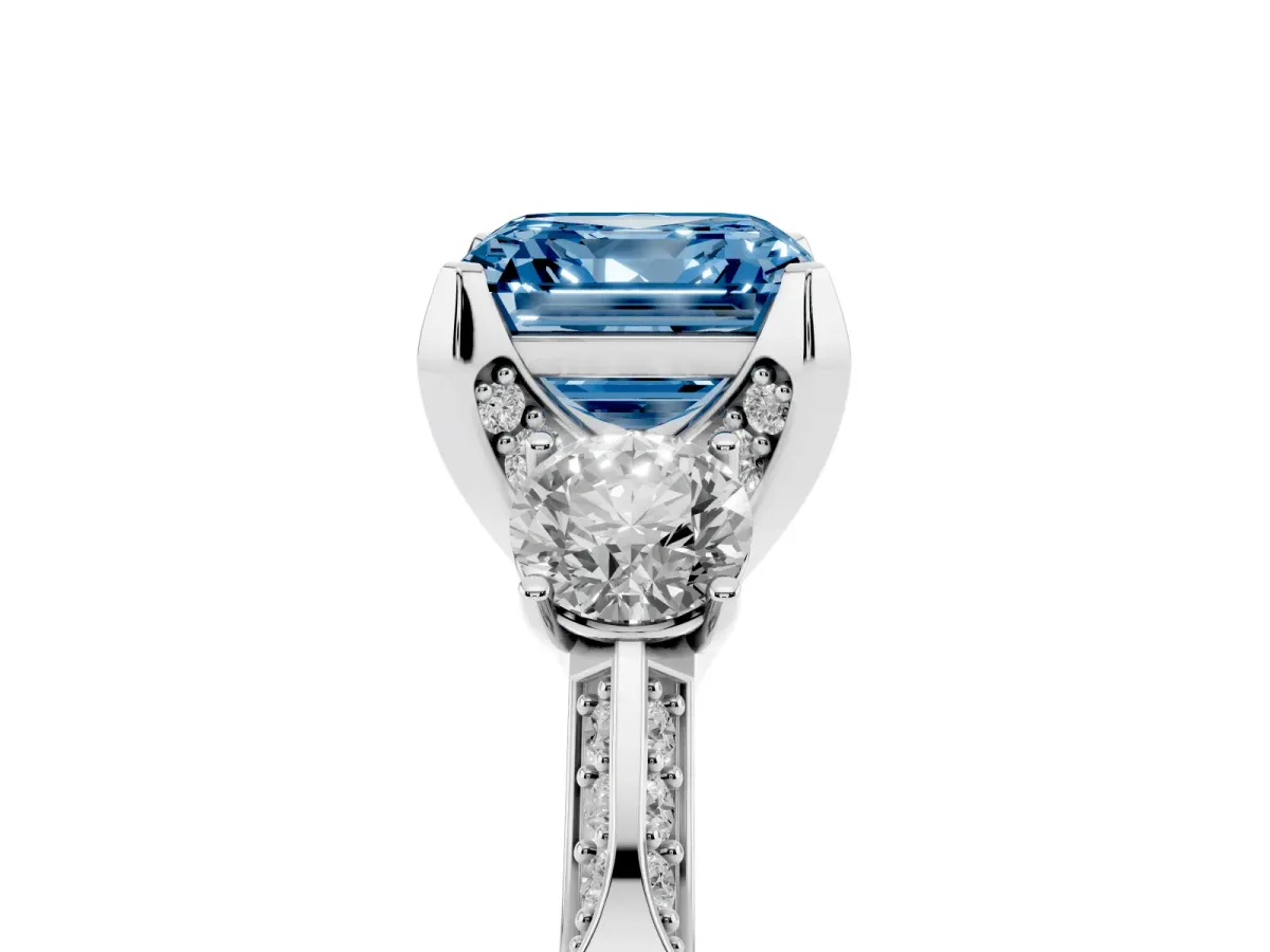 Fancy Blue Asscher Cut Brilliant Three-Stone Diamond Ring with Pavé Band and Four-Prong Setting White gold
