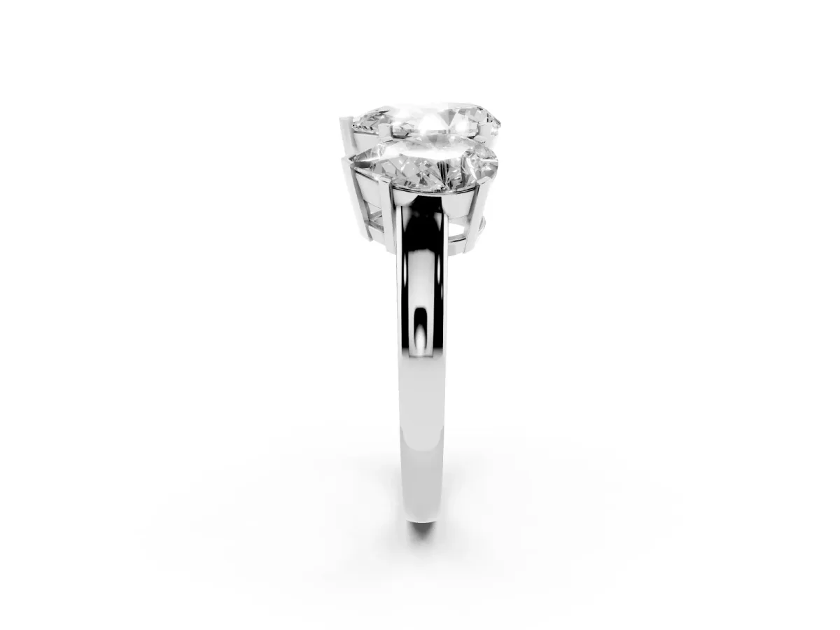 Three-Stone Pear Cut Cut Diamond Ring with Channel Set Band and Four-Prong Setting Platinum