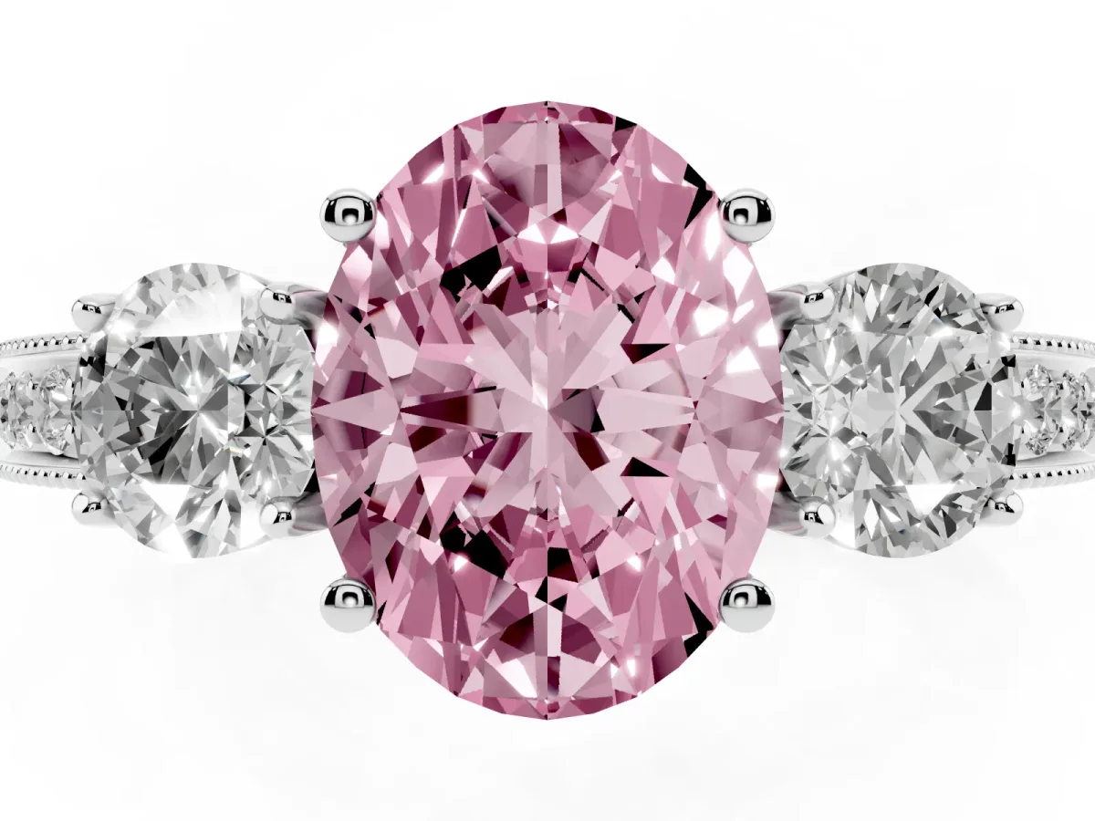 Fancy Pink Oval Cut Three-Stone Diamond Ring with Pavé Band and Four-Prong Setting Silver
