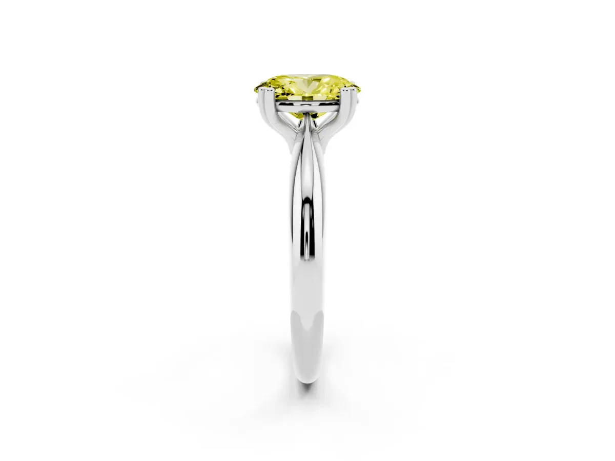 Fancy Yellow Oval Cut Cut Solitaire Engagement Ring with Tapered Band and Four-Prong Setting Silver
