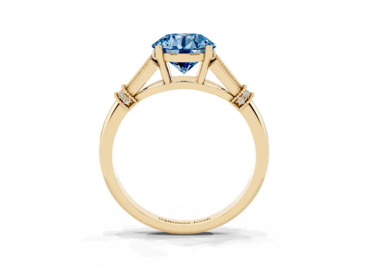 Fancy Blue Round Cut Diamond Solitaire Ring with Floral Filigree and Pave Accents Yellow gold