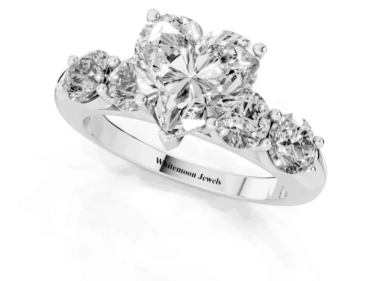Heart Cut Cut Five-Stone Prong Set Diamond Ring with Classic Band Platinum
