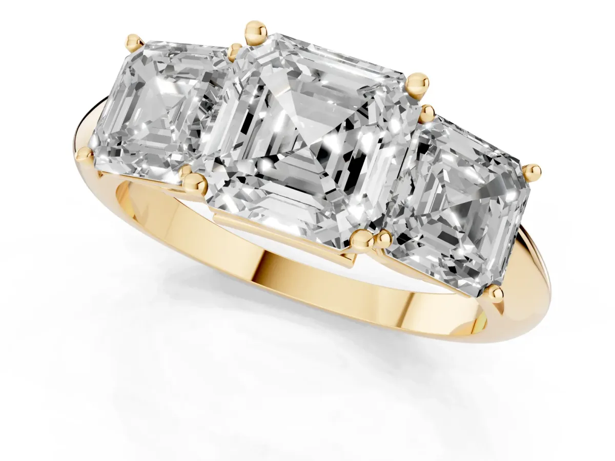 Three-Stone Asscher Cut Cut Diamond Engagement Ring with Prong Setting on a White Gold Band Yellow gold