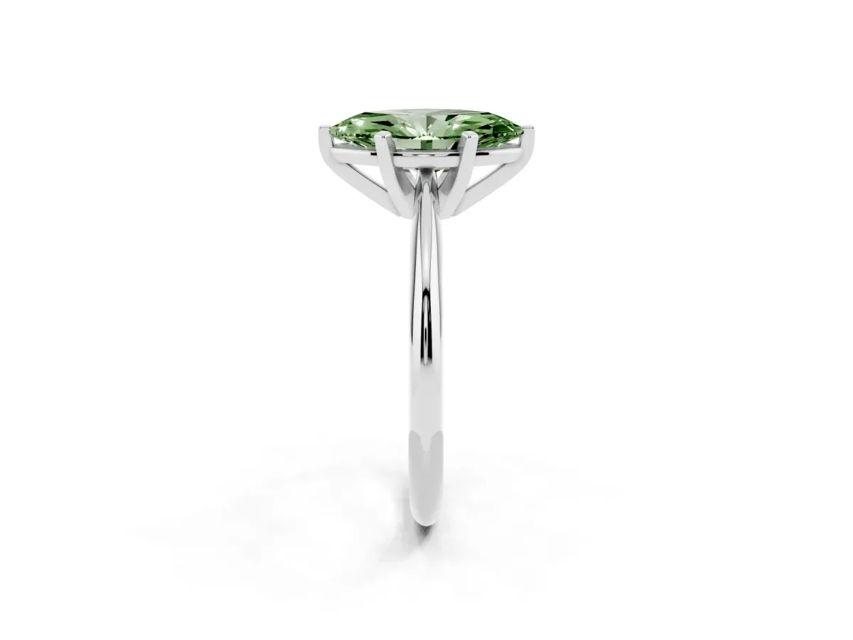 Fancy Green Marquise Cut Cut Solitaire Ring with Four-Prong Setting on a Classic Band Silver