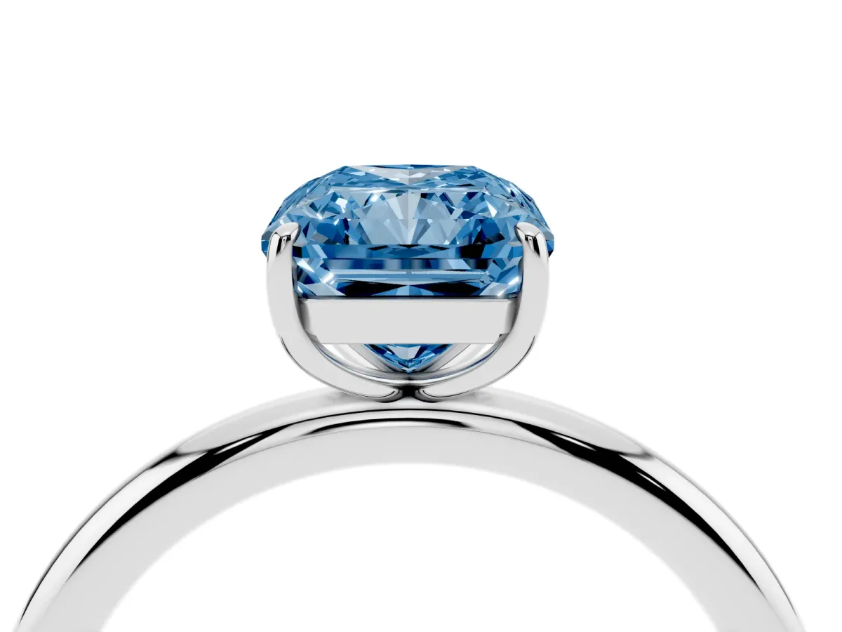 Fancy Blue Radiant Cut Solitaire Diamond Ring with Four-Prong Setting on a Plain Band White gold