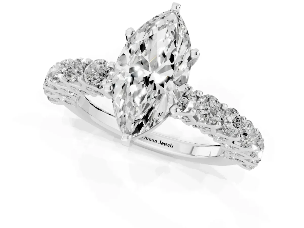 Marquise Cut Diamond Solitaire Ring with Shared Prong Pavé Band and Four-Prong Setting Platinum