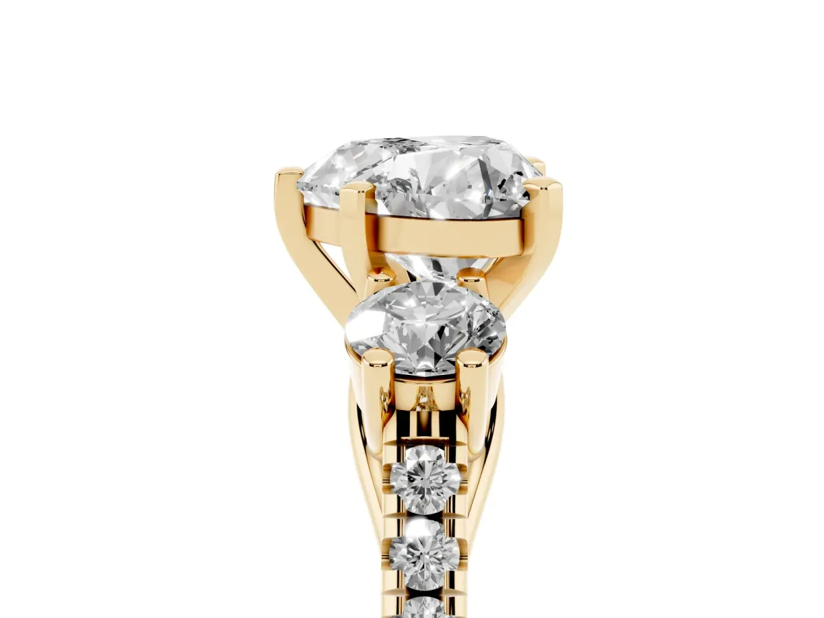 Three-Stone Heart Cut Diamond Pavé Band with Four-Prong Setting Yellow gold