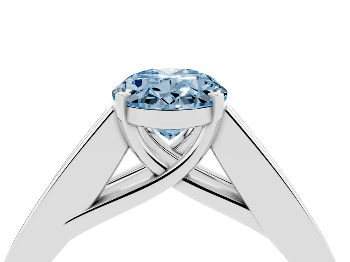 Fancy Blue Oval Cut Cut Channel Set Solitaire Ring with Four-Prong Setting White gold
