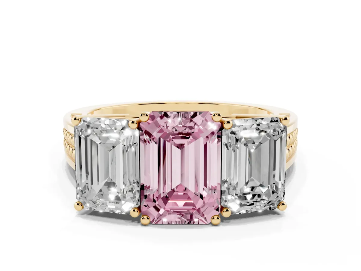 Fancy Pink Emerald Cut Diamond Three-Stone Ring with Prong Setting and Textured Band Yellow gold