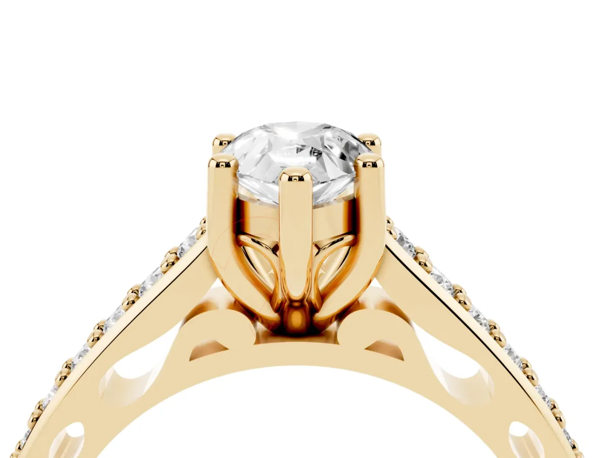 Pear Cut Solitaire Prong Set Diamond Engagement Ring with Pave Band Yellow gold