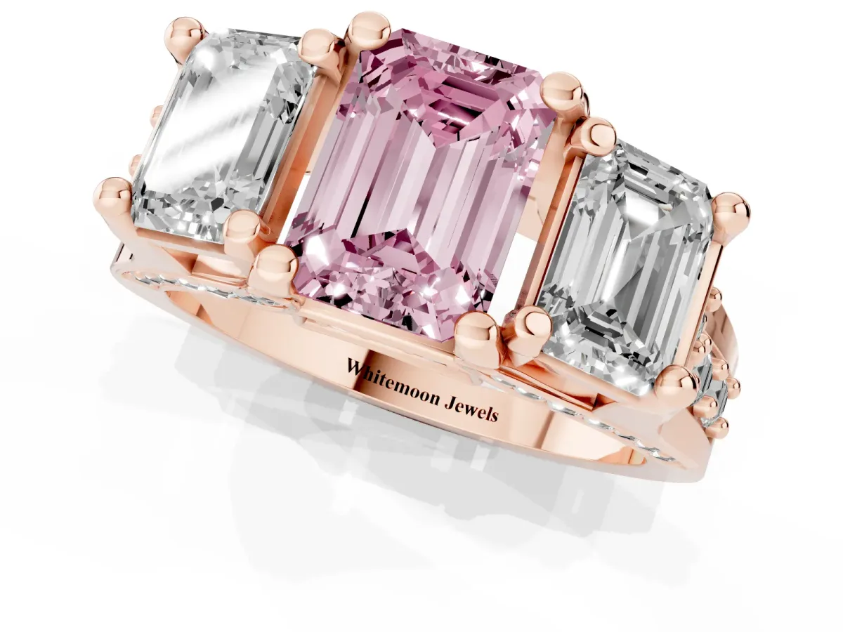 Fancy Pink Emerald Cut Diamond Three-Stone Ring with Channel Set Band and Four-Prong Setting Rose gold