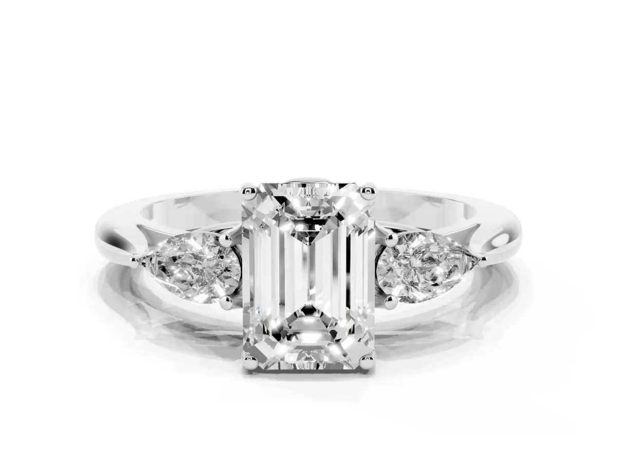 Three-Stone Emerald Cut Brilliant Diamond Solitaire Ring with Tapered Band and Four-Prong Setting Platinum