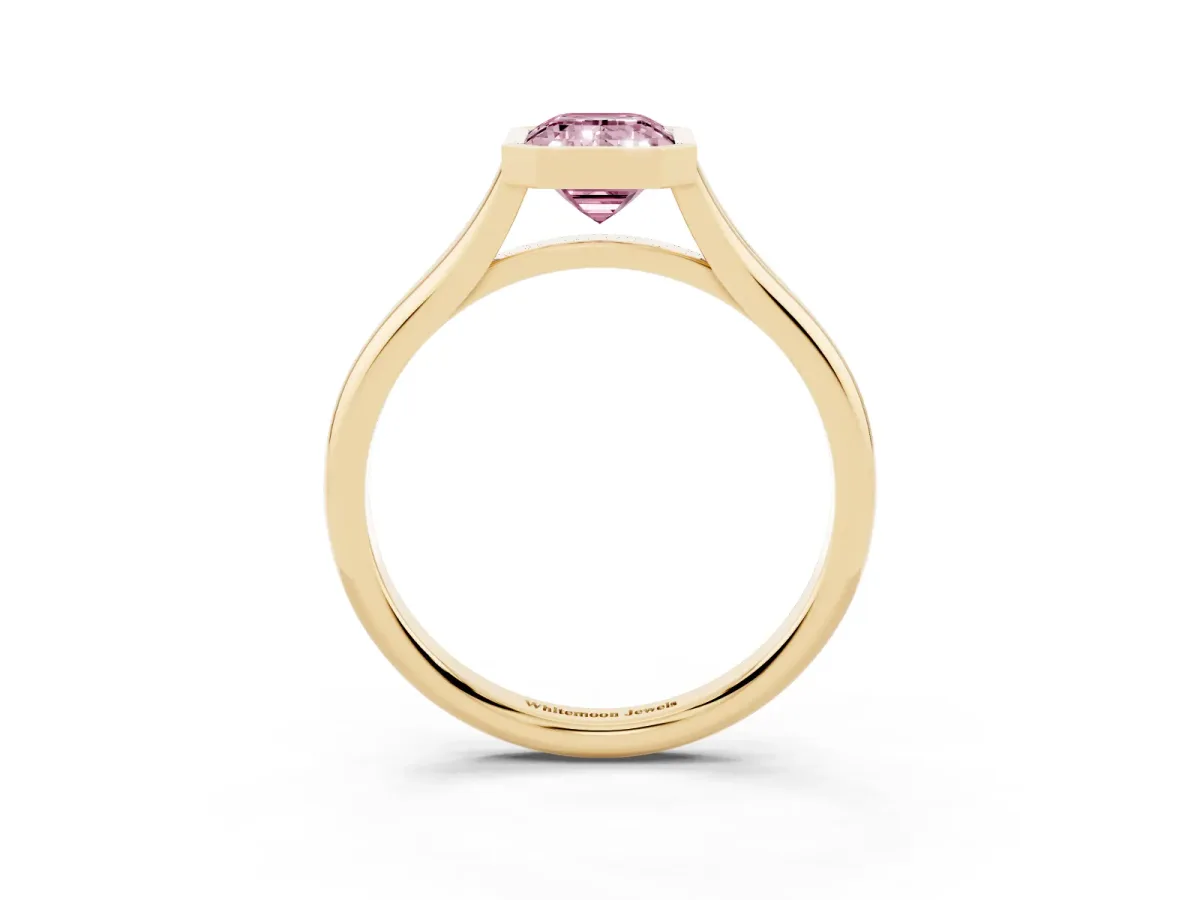 Fancy Pink Bezel Set Emerald Cut Cut Solitaire Ring with Tapered Band Yellow gold