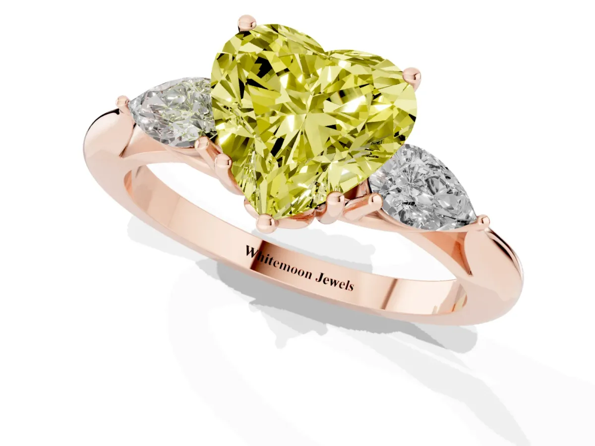 Fancy Yellow Heart Cut Diamond Three-Stone Ring with Pear Side Stones and Prong Setting Rose gold
