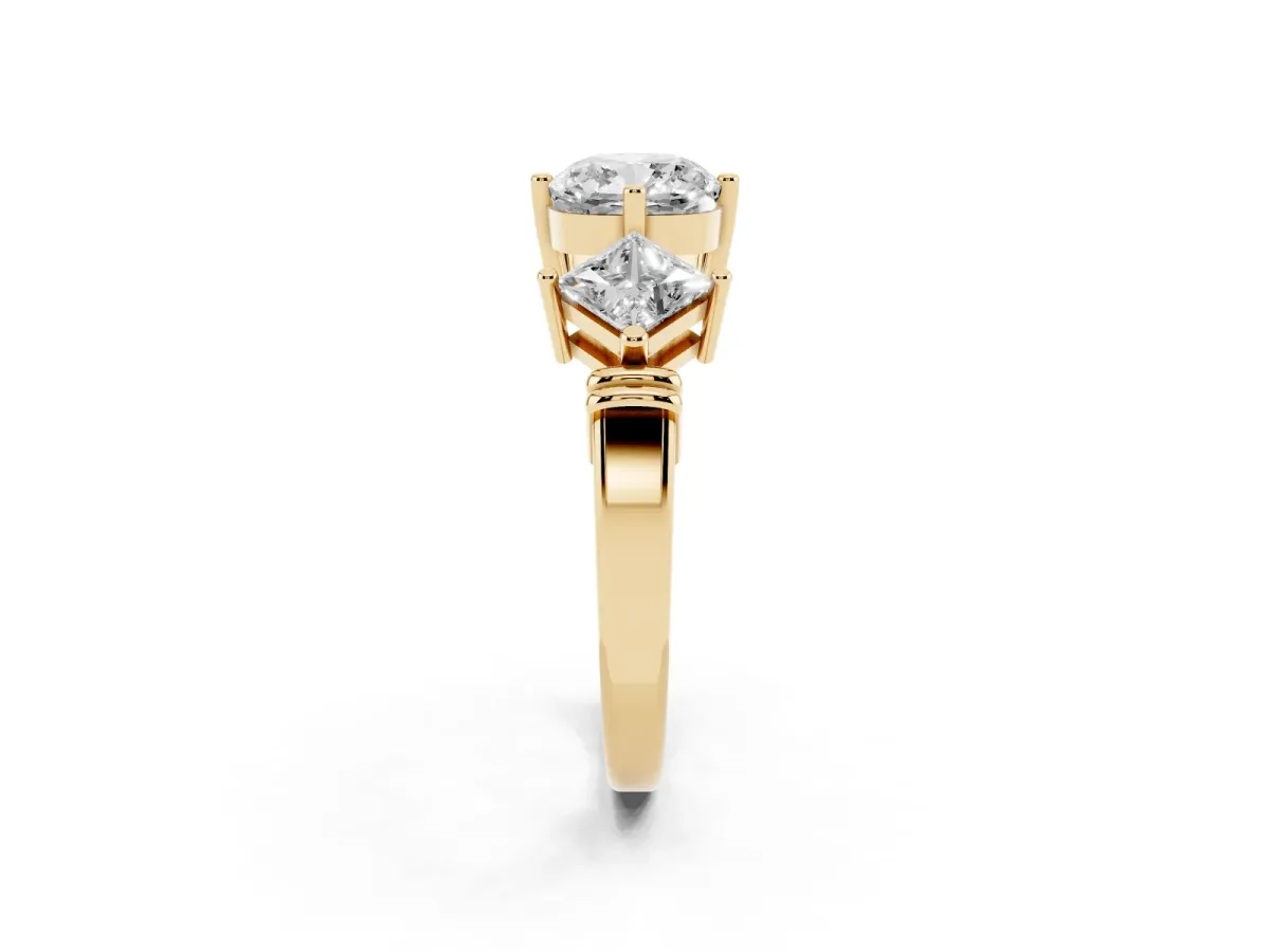 Three-Stone Cushion Cut and Princess Cut Diamond Ring with Channel Band and Four-Prong Setting Yellow gold