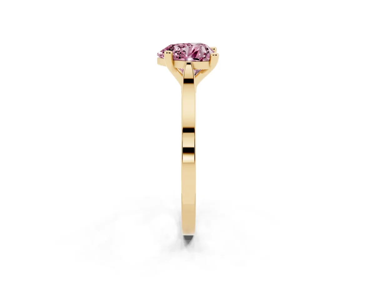 Fancy Pink Heart Cut Solitaire Diamond Ring with Four-Prong Setting and Tapered Band Yellow gold