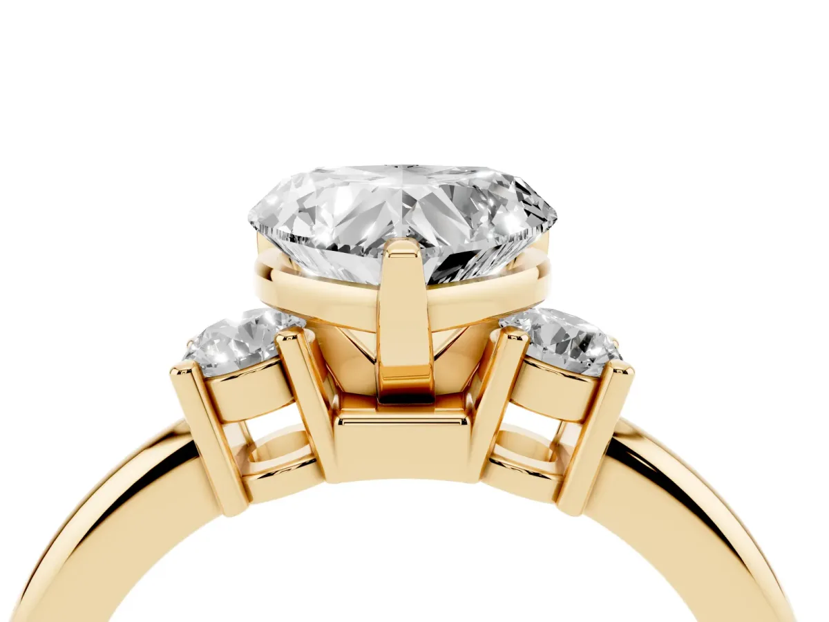 Three-Stone Heart Cut Cut Diamond Solitaire with Prong Setting and Classic Band Yellow gold