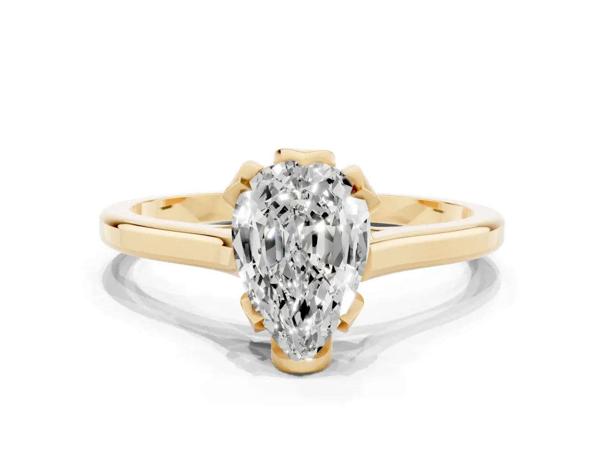 Pear Cut Diamond Solitaire Ring with Flower Prong Setting and Classic Band Yellow gold