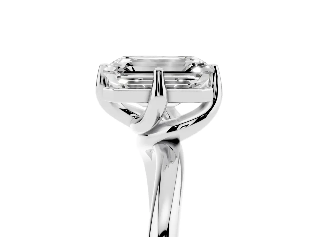 Emerald Cut Diamond Solitaire Engagement Ring with Four-Prong Setting and Classic Band Silver