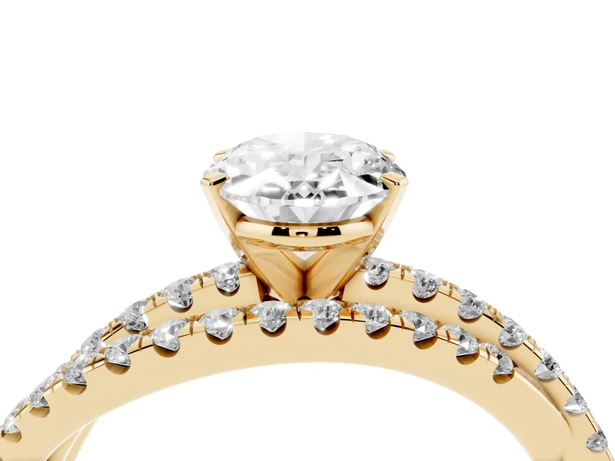 Oval Cut Solitaire Twist Band with Pavé Setting and Four-Prong Setting Yellow gold