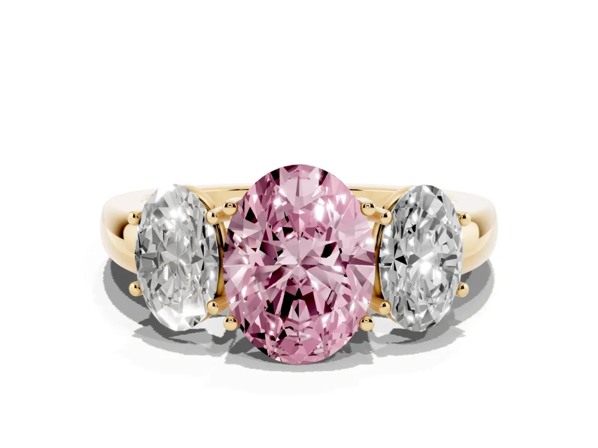 Fancy Pink Oval Cut Diamond Three-Stone Ring with Four-Prong Setting and Classic Band Yellow gold