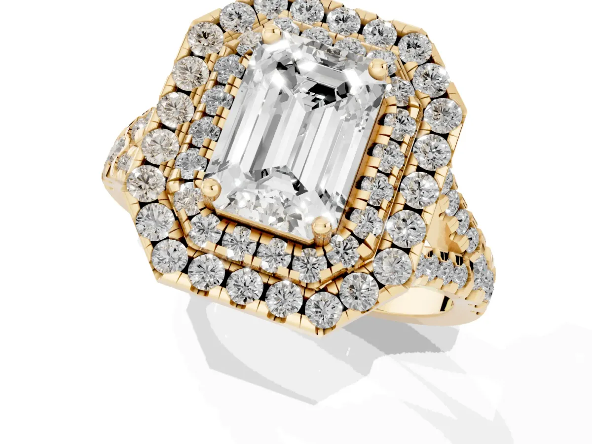 Double Halo Emerald Cut Diamond Pavé Split Shank Ring with Prong Setting Yellow gold