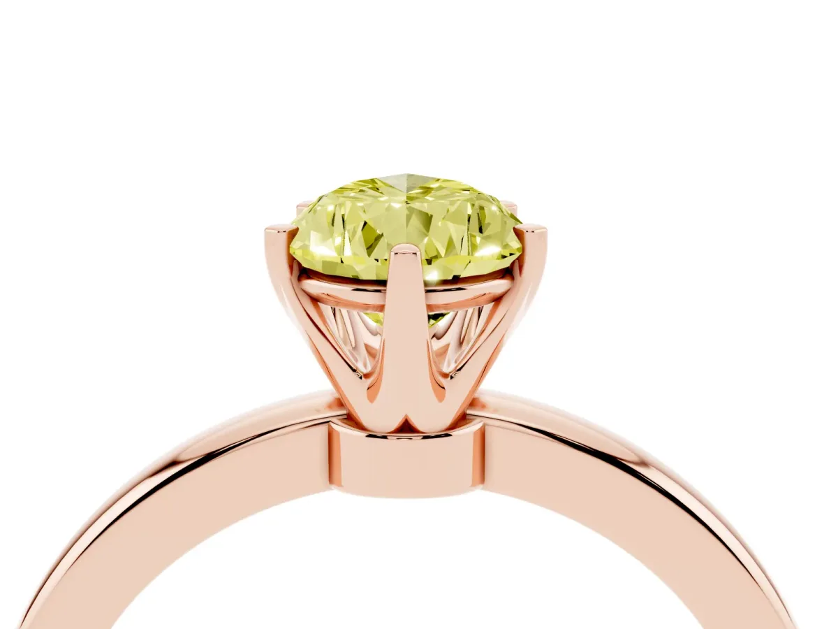 Fancy Yellow Pear Cut Solitaire Diamond Ring with Six-Prong Setting on a Classic Band Rose gold