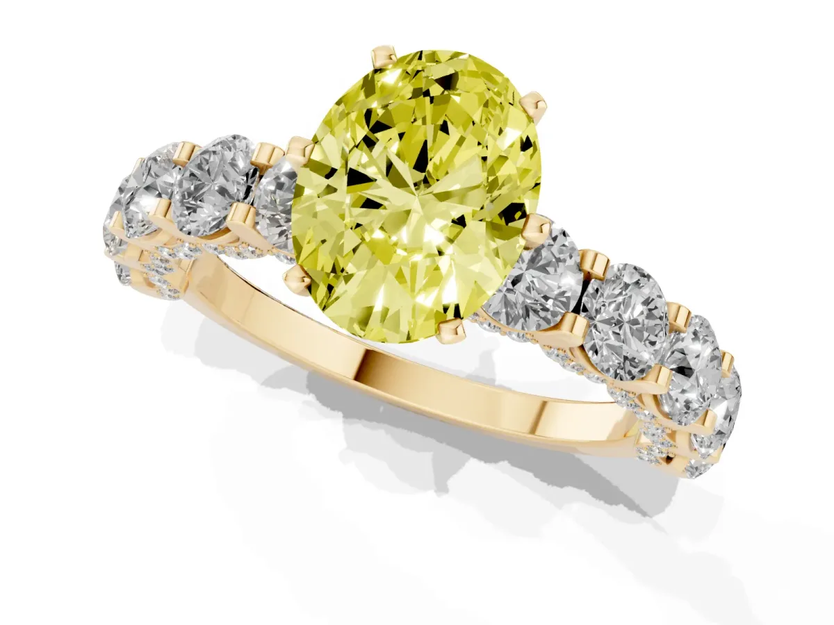 Fancy Yellow Oval Cut Diamond Side Stone Engagement Ring with Four-Prong Setting Yellow gold
