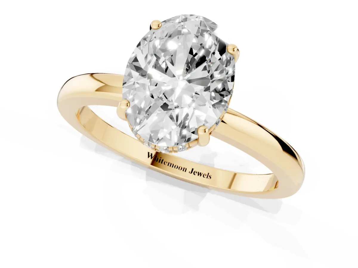 Oval Cut Solitaire Diamond Ring with Prong Setting and Plain Band Yellow gold