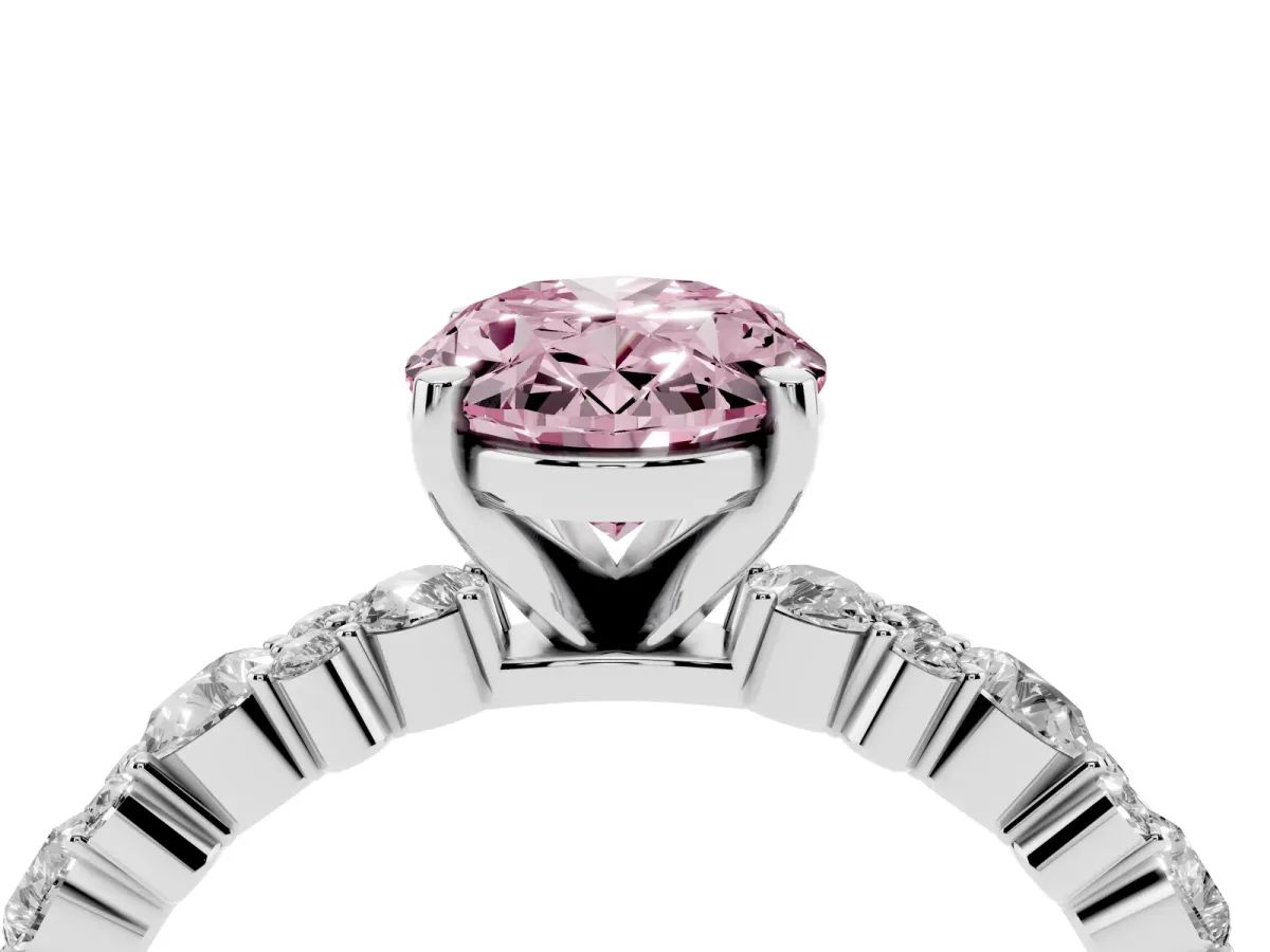 Fancy Pink Oval Cut Diamond Side Stone Solitaire Ring with Round and Four-Prong Setting Platinum