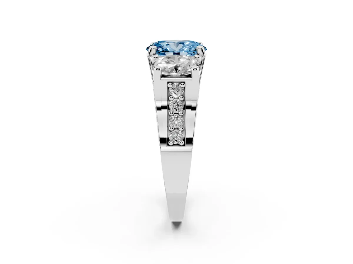 Fancy Blue Oval Cut Diamond Three-Stone Ring with Channel Set Band and Four-Prong Setting Silver