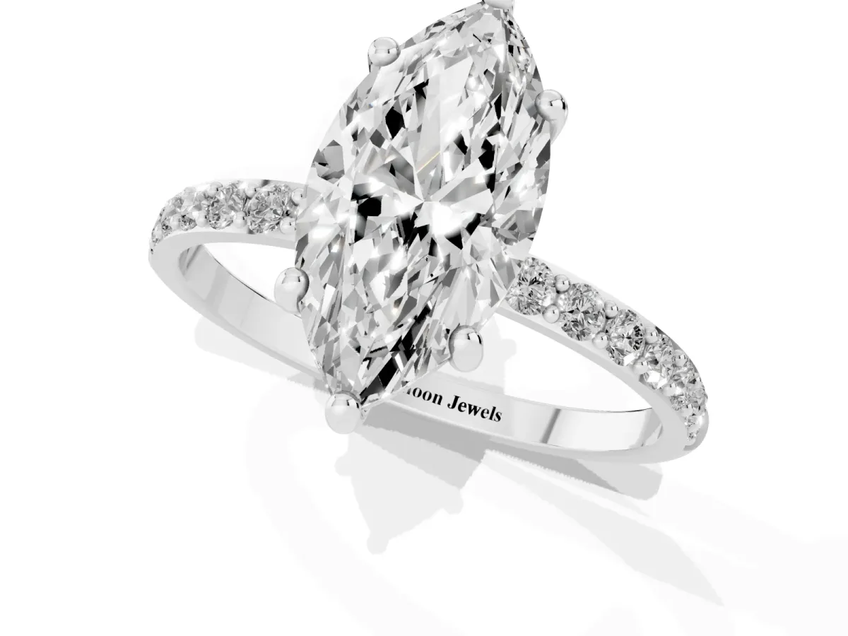 Marquise Cut Diamond Solitaire Ring with Round Pavé Band and Prong Setting Silver