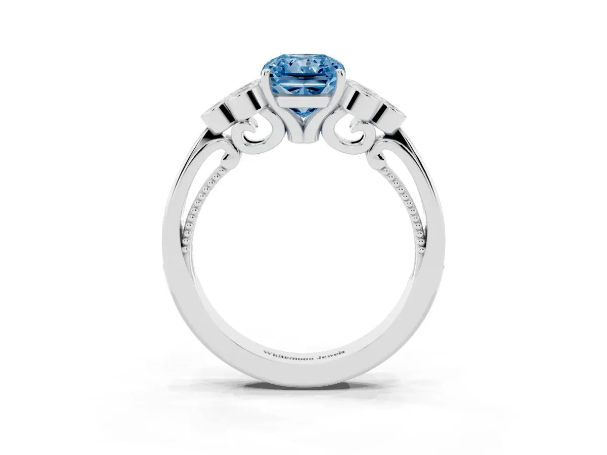 Fancy Blue Radiant Cut Cut Diamond Engagement Ring with Bezel Set Round Side Stones and Prong Setting Platinum